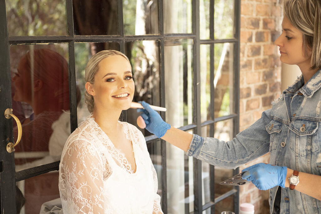 Getting ready for Nicole's wedding day at Lace on Timber, Bridal glam by Storm Pass Makeup, photography by Kevin Mark Pass
